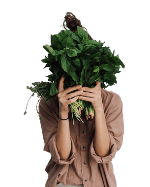 woman holding herbs